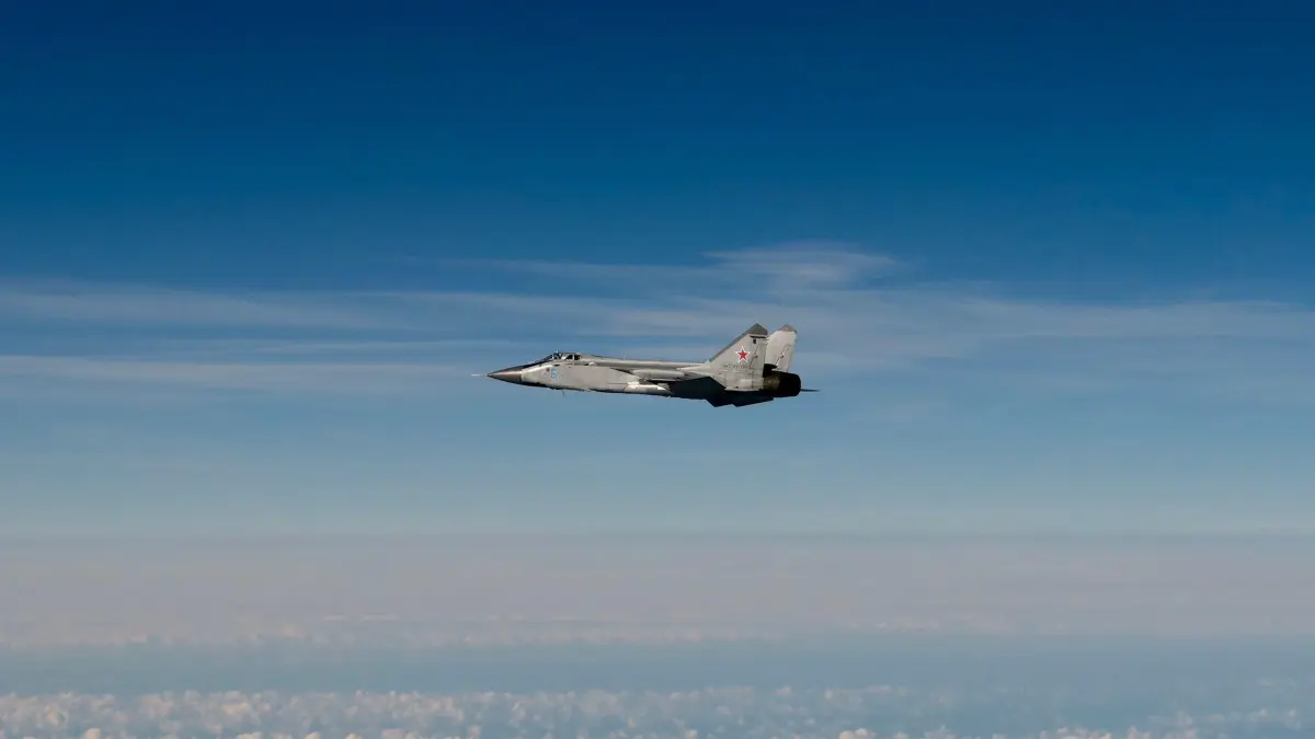 This September 19, 2025 Hand Out image released by the Swedish Airforce shows a Russian MIG-31 fighter jet flying above the Baltic sea after violating Estonian air space. Three Russian MiG-31 fighters violated Estonian airspace over the Gulf of Finland on Friday, Estonia said, triggering complaints of a dangerous new provocation from the EU and NATO. Sweden and Finland scrambled rapid reaction aircraft, a spokesman for the Supreme Headquarters Allied Powers Europe (SHAPE) told reporters. (Photo by Forsvarsmakten / HANDOUT / AFP) / RESTRICTED TO EDITORIAL USE - MANDATORY CREDIT "AFP PHOTO / SOURCE / BYLINE" - HANDOUT - NO MARKETING NO ADVERTISING CAMPAIGNS - DISTRIBUTED AS A SERVICE TO CLIENTS