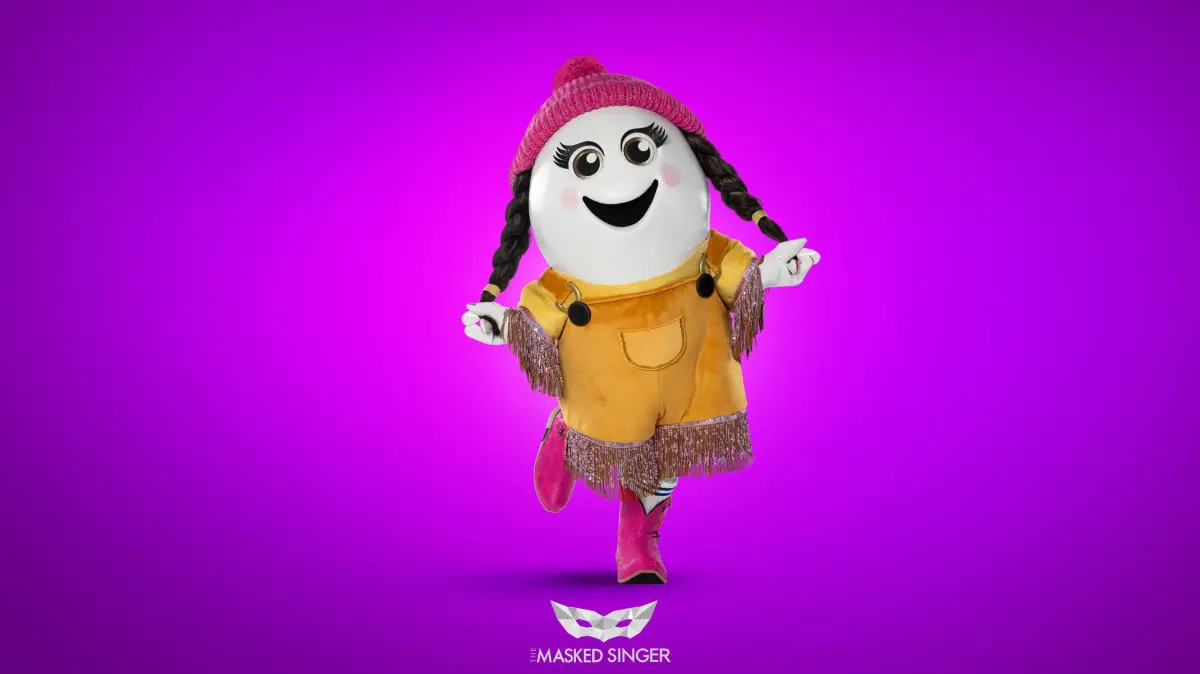Eggi überzeugt mit ihren pinken Cowboyboots und passender Mütze.
