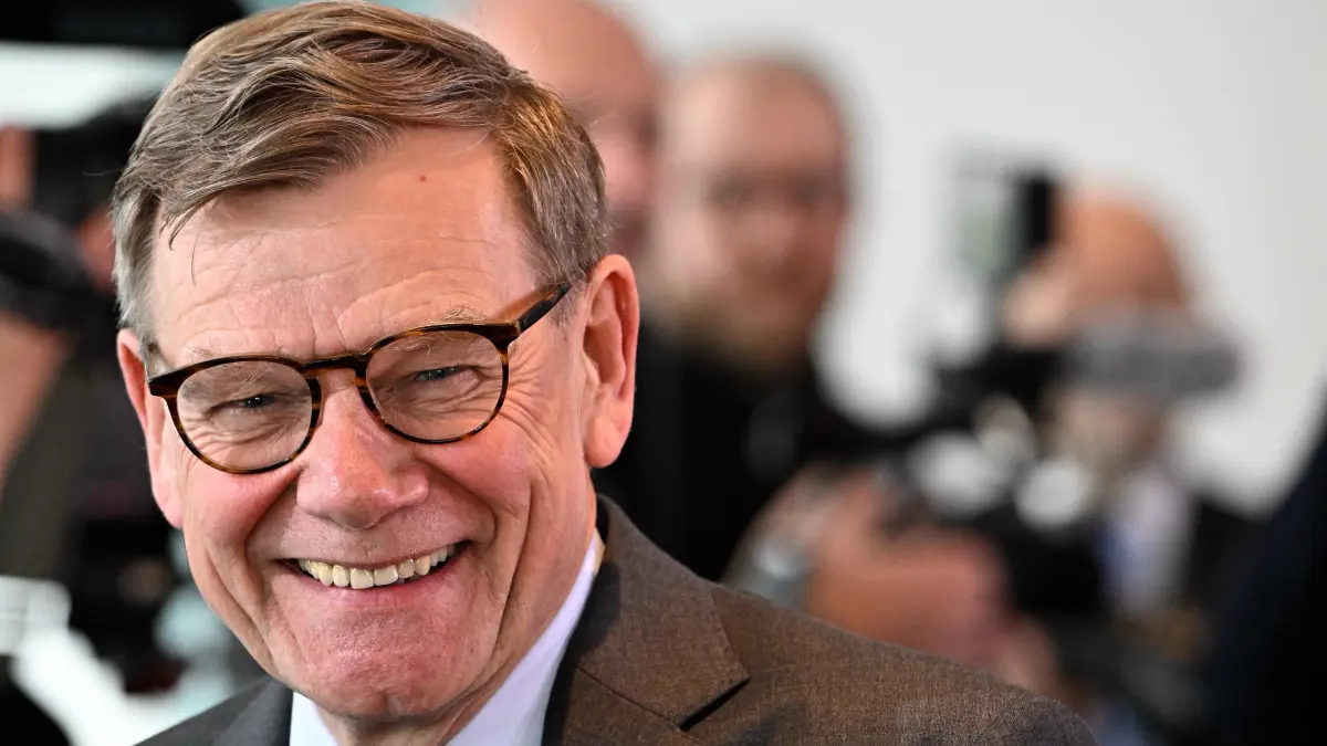 German Foreign Minister Johann Wadephul smiles as he arrives for the weekly cabinet meeting at the Chancellery in Berlin on May 20, 2026. (Photo by Tobias SCHWARZ / AFP)