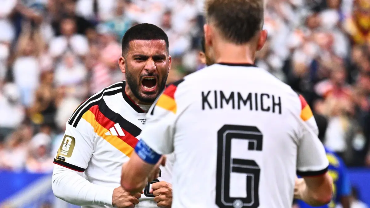 WM 2026 - Deutschland - Curaçao: 14.06.2026, USA, Houston: Fußball, Männer: WM, Deutschland - Curaçao, Vorrunde, Gruppe E, 1. Spieltag, Houston-Stadion, Deniz Undav (Deutschland) bejubelt sein Tor zum 6:1 mit Joshua Kimmich (Deutschland). ACHTUNG: Gemäß den Auflagen der FIFA dürfen die Bilder ausschließlich zur redaktionellen Verwendung genutzt werden. Eine kommerzielle Nutzung ist ausgeschlossen. Zudem dürfen keine videoähnlichen Sequenzen erstellt werden, und es dürfen keine Veränderungen weder im Vordergrund noch im Hintergrund am Bild vorgenommen werden. Foto: Tom Weller/dpa +++ dpa-Bildfunk +++