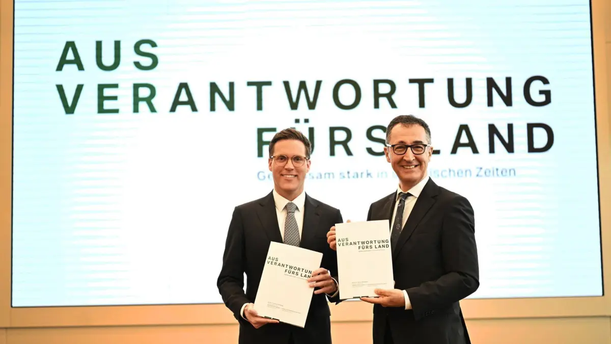 „Verantwortung fürs Land“ : Koalitionspartner Manuel Hagel (CDU), Cem Özdemir (Grüne)