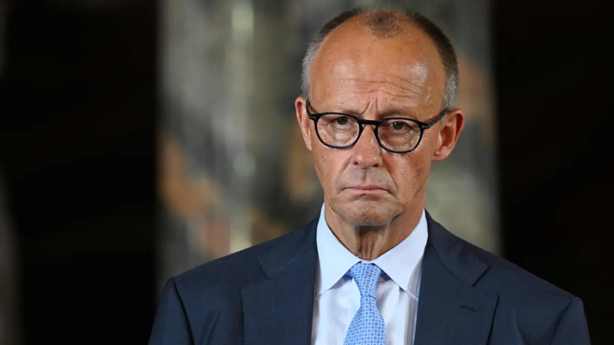 GERMANY-FRANCE-DIPLOMACY-PRESSER: German Chancellor Friedrich Merz looks on during a joint press conferen with France's President in the Augustusburg castle during the 26th German-French cabinet in Bruehl, western Germany, on July 17, 2026. (Photo by INA FASSBENDER / AFP)