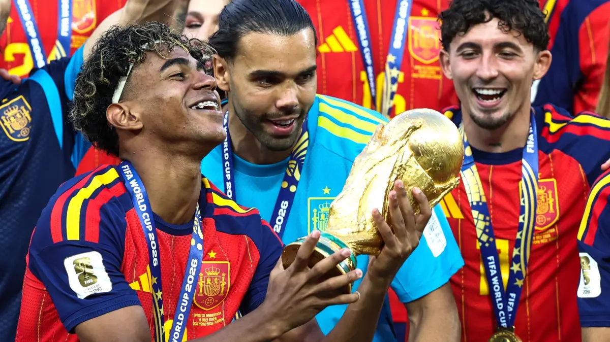 FBL-WC-2026-MATCH104-ESP-ARG-FINAL-TROPHY: Spain's forward #19 Lamine Yamal lifts the trophy after winning the 2026 World Cup football tournament final match between Spain and Argentina at the New York/New Jersey Stadium in East Rutherford on July 19, 2026. (Photo by FRANCK FIFE / AFP)