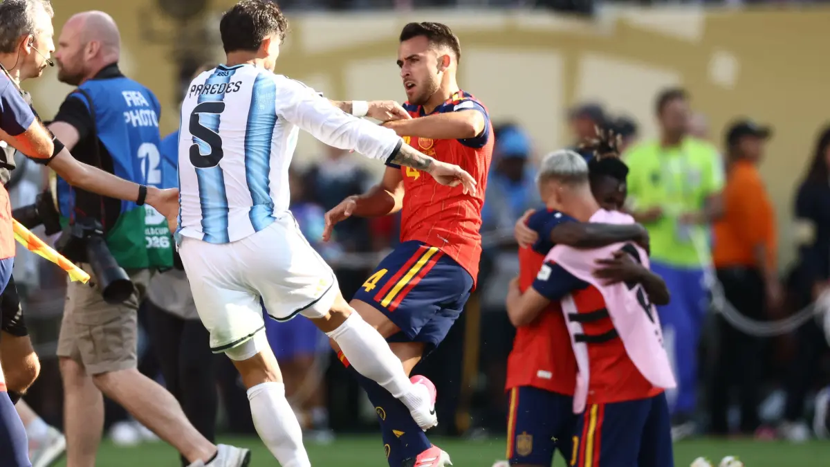 FBL-WC-2026-MATCH104-ESP-ARG-FINAL: Argentina's midfielder #05 Leandro Paredes (L) clashes with Spain's defender #04 Eric Garcia at the end of the 2026 World Cup football tournament final match between Spain and Argentina at the New York/New Jersey Stadium in East Rutherford on July 19, 2026. (Photo by CHARLY TRIBALLEAU / AFP)