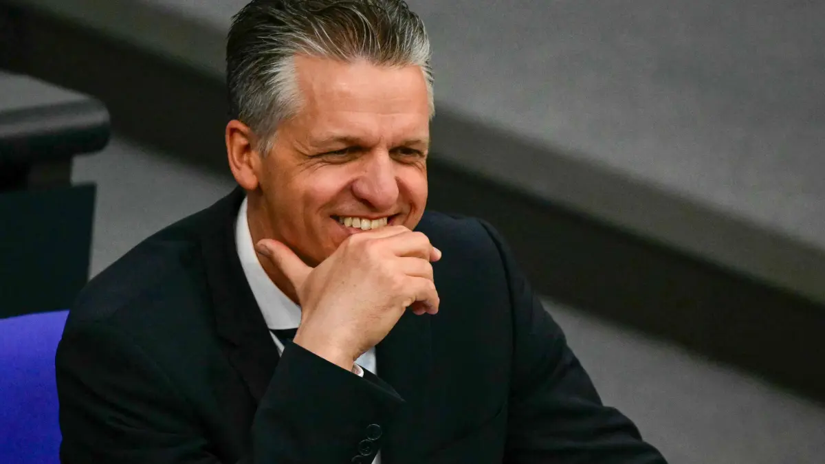 FILES-GERMANY-POLITICS-PARTIES-CDU: (FILES) Chief of Staff and Minister for Special Tasks Thorsten Frei smiles while attending a session at the Bundestag, the German lower house of parliament, in Berlin on May 15, 2025. According to German media on July 22, 2026, Thorsten Frei, the right-hand man of the German Chancellor, will take over as the Germany's Christian Democratic Union (CDU) parliamentary group leader, after a controversy over the use of a surrogate mother abroad forced out the previous chairman. Jens Spahn resigned his post as chairman of the centre-right CDU/CSU party's faction in parliament on July 18, 2026 after several days of mounting criticism over his use of a surrogate mother in the United States. (Photo by Tobias SCHWARZ / AFP)