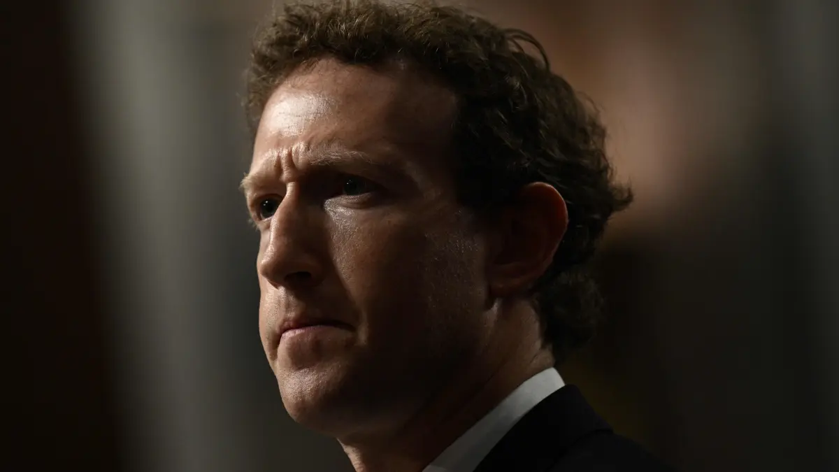 FILES-US-TECHNOLOGY-POLITICS-AI: (FILES) Mark Zuckerberg, CEO of Meta, looks on during the US Senate Judiciary Committee hearing "Big Tech and the Online Child Sexual Exploitation Crisis" in Washington, DC, on January 31, 2024. Meta chief executive Mark Zuckerberg on August 10, 2026, called for lower barriers for open source AI, as his company introduced a new model that can run on a personal computer. The launch comes amid debate in the United States on whether access to the technology should be more restricted, and on local pushback against the buildout of data centers that power it. (Photo by Brendan SMIALOWSKI / AFP)