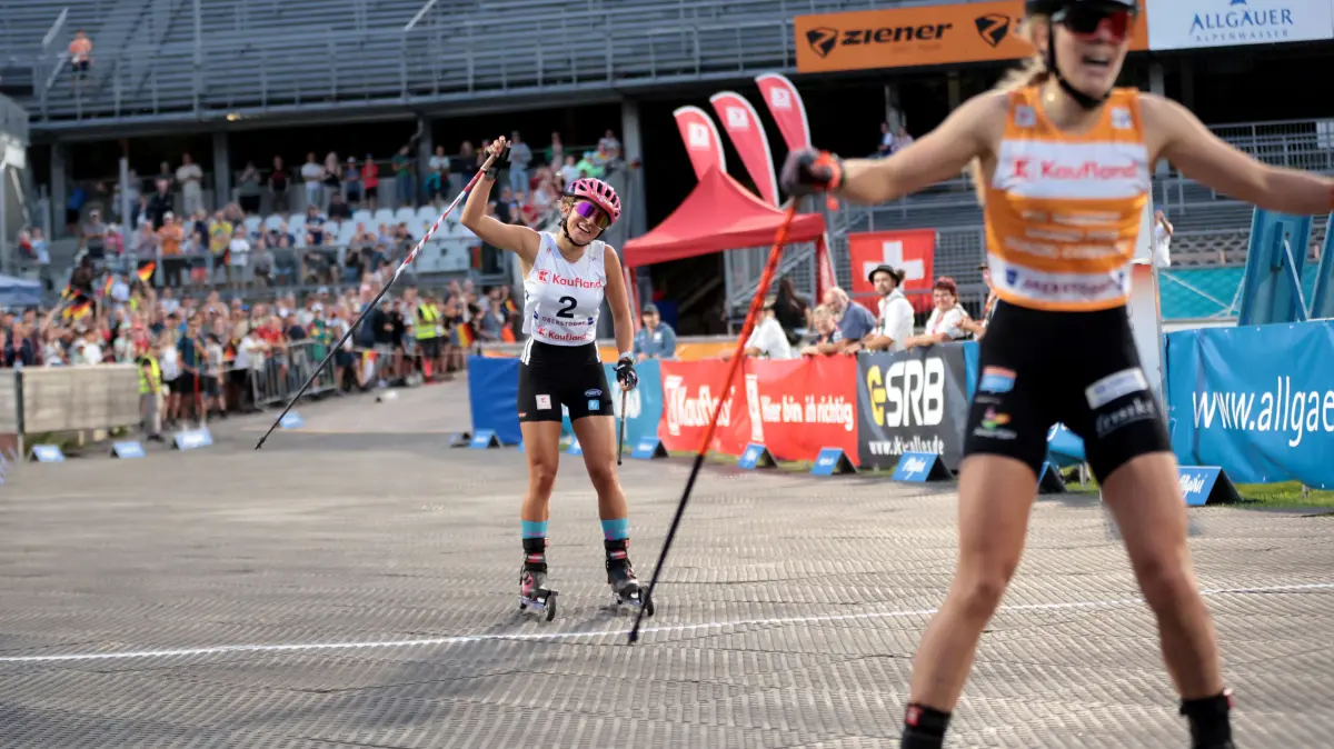 FIS Nordic Combined Summer Grand Prix in Oberstdorf, Germany: Ida Marie HAGEN, NOR, Bib Number 5, Run 2, Winner Photo,
Nathalie ARMBRUSTER, GER, Bib Number 2,
, Women's Individual Compact Large Hill/5km at FIS Nordic Combined Summer Grand Prix in Oberstdorf, Germany, 2026-08-19, Photo Credit: action press / NocoGirls