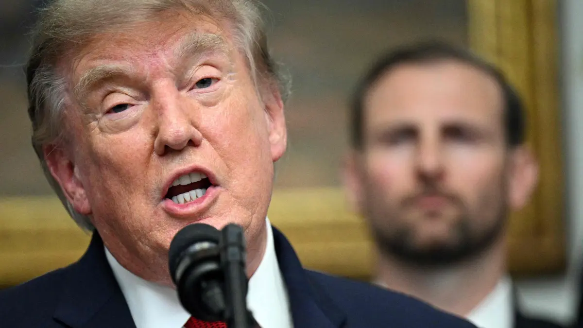 US-POLITICS-TRUMP: US President Donald Trump delivers remarks during a meeting with cryptocurrency executives in the Roosevelt Room of the White House in Washington, DC, on August 19, 2026. (Photo by Jim WATSON / AFP)