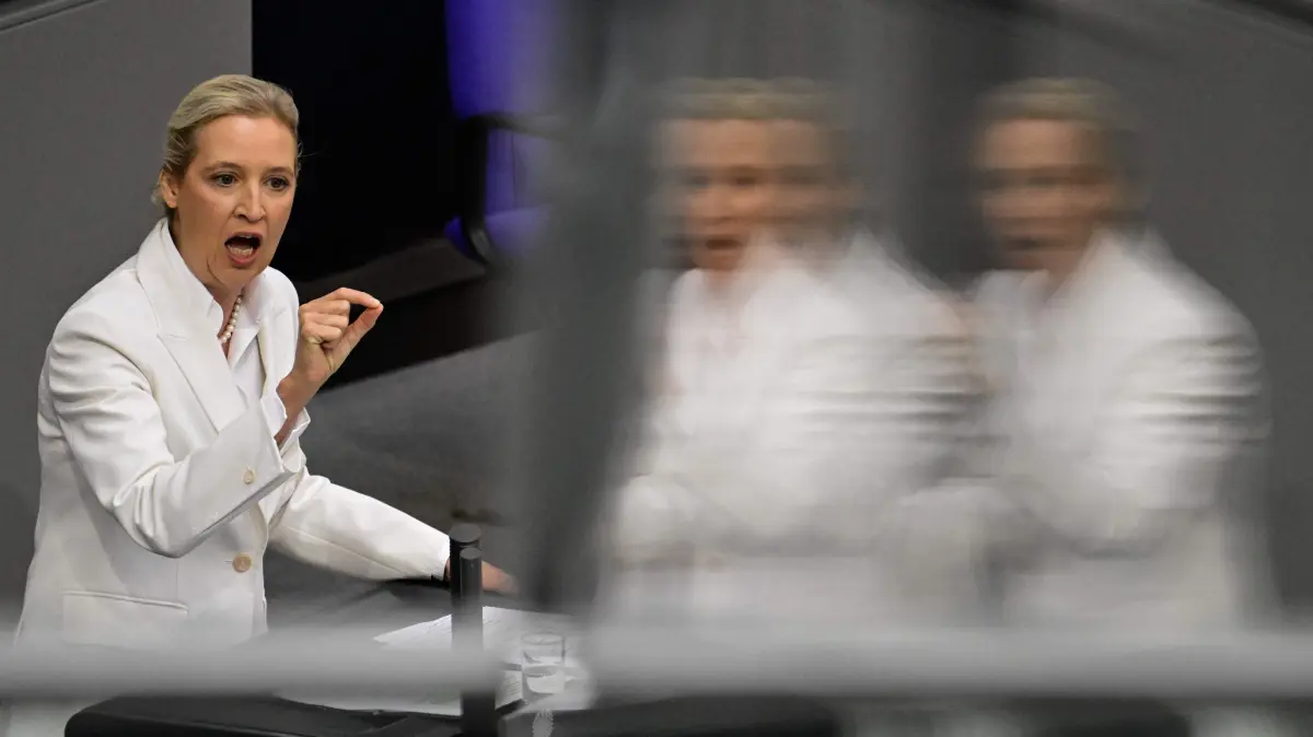 GERMANY-POLITICS-BUDGET: The co-leader of the far-right Alternative for Germany (AfD) party Alice Weidel is reflected as she gives her speech as at the Bundestag, the lower house of parliament, in Berlin on September 9, 2026. (Photo by John MACDOUGALL / AFP)