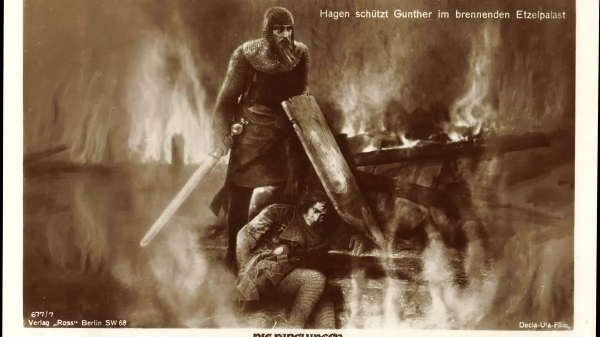 Hagen von Tronje schützt König Gunther: Szene aus dem deutschen Filmepos "Die Nibelungen" von Fritz Lang aus dem Jahr 1924.