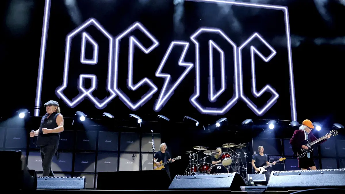 AC/DC In Concert - East Rutherford, NJ: EAST RUTHERFORD, NEW JERSEY - OCTOBER 02: (L-R) Brian Johnson, Stevie Young, Matt Laug, Chris Chaney, and Angus Young of AC/DC perform during their Power Up tour at MetLife Stadium on October 02, 2026 in East Rutherford, New Jersey. Mike Coppola/Getty Images/AFP (Photo by Mike Coppola / GETTY IMAGES NORTH AMERICA / Getty Images via AFP)