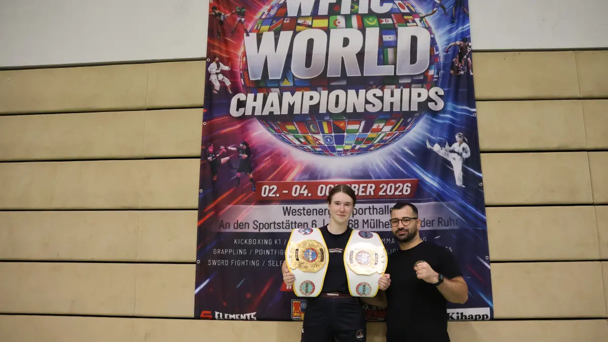 Zweimal Gold - Laura Schmieder ist zweifache Weltmeisterin, stolz ist auch ihr Trainer Berhan Keles.