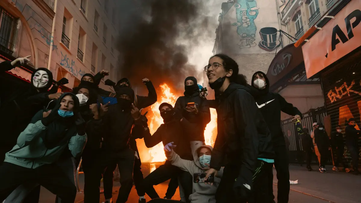 Second Day Of Paris Riots: October 18, 2026, Paris, France: PARIS, FRANCE - OCTOBER 18, 2026: Protesters clash with police near Place de la RÃ publique in Paris during a protest against austerity. Protesters set up makeshift barricades and start fires in the square and surrounding streets. After police clear the square, protesters attack nearby shops. Paris France - ZUMAq101 20261018_zna_q101_292 Copyright: xOualidxAbdellaouix